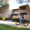 Matthew Alvarez, 10, rides a bike donated by UCPD at the Oban Family Housing at UC Riverside on Friday, September 17, 2021. Officers and staff from the University of California Riverside Police Department purchased an assortment of bikes for the children living at UCR’s family housing community. (UCR/Stan Lim)